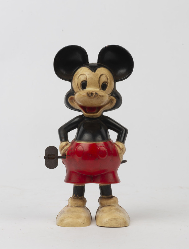 MICKEY MOUSE: whirl-a-way plastic toy, the wind-up mechanism activating Mickey's tail, marked "W.D.P.", made by Louis Marx (USA); c.1950s, height 15cm.