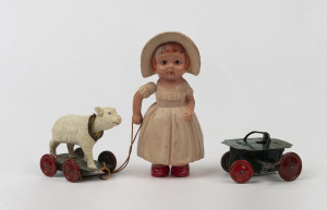 "LITTLE BO PEEP & LAMB": celluloid and tinplate windup toy, lamb's head bobs when in motion; made in Japan, c.1930s; height 16.5cm.