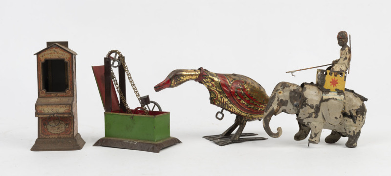 Tinplate toy selection comprising Louis Marx (USA) wind-up "Golden Goose"; Stollwerck Bros candy "Liliputian Savings Bank" candy store; unusual "buckets on a pulley" wheel-driven toy, plus wind-up "Mahout riding Elephant" with rearing motion when activate