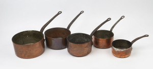 A graduated set of five copper saucepans, 20th century, ​the largest 13.5cm high, 26cm diameter