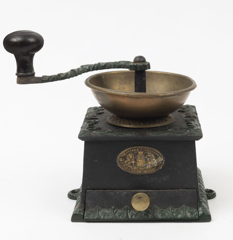 An antique cast iron coffee mill with brass maker's plaque "C. & T. Clark & Co. Improved Coffee Mill", 19th century, ​20cm high
