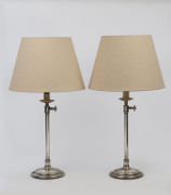 A pair of adjustable table lamps and shades, with silvered finish, late 20th century, ​66cm high overall
