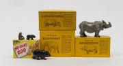 BRITAINS: - Boxed - Zoo Animals: hollow cast lead selection comprising Indian Elephant (No.901), Hippopotamus (No.905), Rhinoceros (No.908) & Brown Bear & Two Cubs (No.9005); c.1950s, largest box size 12x9cm. (4)