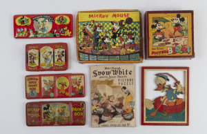 DISNEY endorsed vintage educational product with large Donald Duck (2) & Mickey Mouse and small Donald Duck paint boxes, Australian made Walter Disney "Picture Blocks" in original box, Donald Duck wooden stencils (2) and several jigsaws. (small qty)