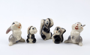 BAMBI: painted and glazed ceramic figurines with "Thumper" the Rabbit (2), "Flower" the skunk (2) plus Flower's mother; all likely made by Modern Ceramic Products (Sydney), one of the Thumper's retaining the MCP foil sticker, c.1930s, tallest 10cm (5).