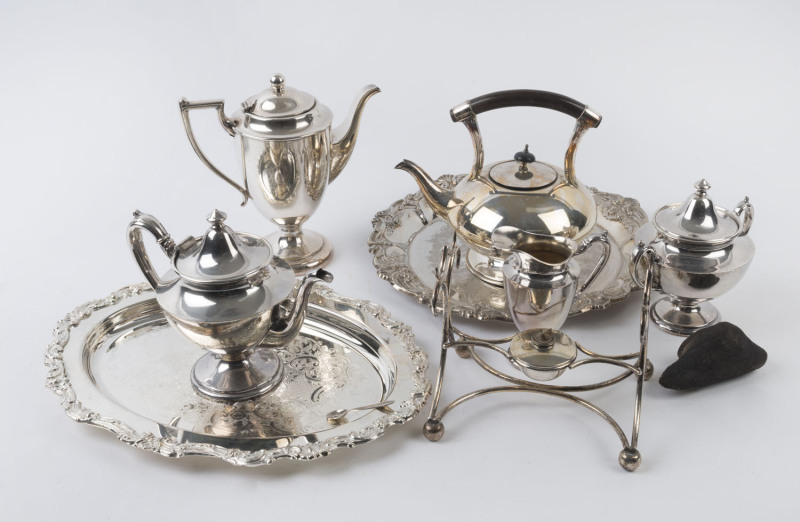 An antique silver plated spirit kettle, four piece tea service and two trays, early to mid 20th century, (7 items), the largest 32cm high