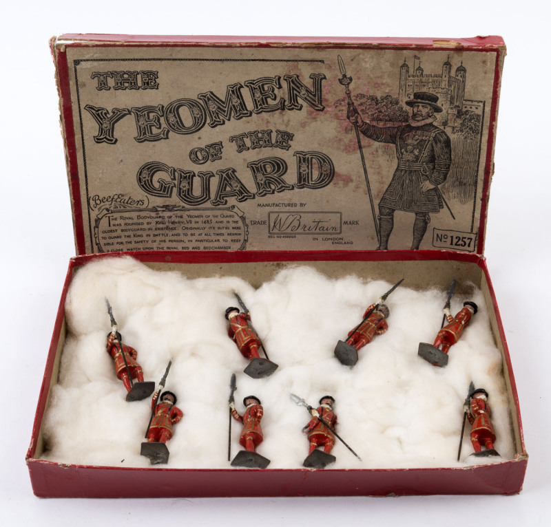 BRITAINS: - Boxed - "Yeoman of the Guard": Series No 1257 set of 8 hollow cast lead figures, articulated right arms holding ornamental partizans; some damage to box with missing edge flap, c.1950s, box size 28 x 17cm.