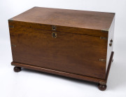 An antique lift top trunk, mahogany with brass bound corners and bun feet, 19th century, ​57cm high, 91cm wide, 50cm deep