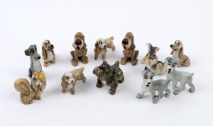 LADY & THE TRAMP: painted and glazed small figurines including "Lady", "Peg" and various "Pound Dog" characters; circa late 1950s. (12)