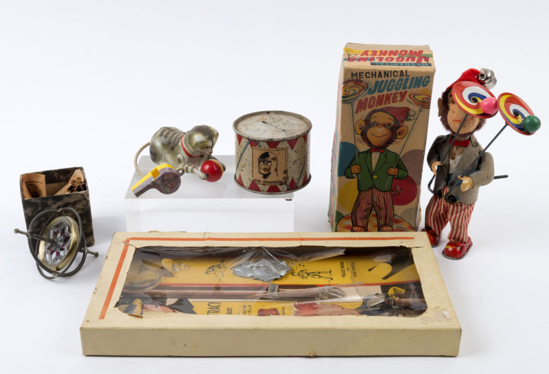 Selection of 1930s-50s vintage toys comprising Mechanical Juggling Monkey (ALPS Toys, Japan) with original box, "Cat & Ball" friction action tinplate toy (Kohler, U.S. Zone, Germany), "Dick Tracy Braces" in original box, drum money box and a Gyroscope. (5