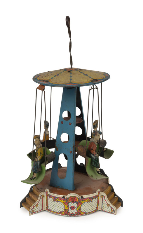 KRAUSE (WILHELM):- lithographed tinplate Carousel with four seated figures, the central pole sets the carousel in motion when pushed downwards; c.1920s, height 33cm.