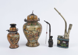 Four assorted vintage and antique Chinese opium pipes, cloisonne, porcelain and metal, late 19th and 20th century, ​the largest 26cm high