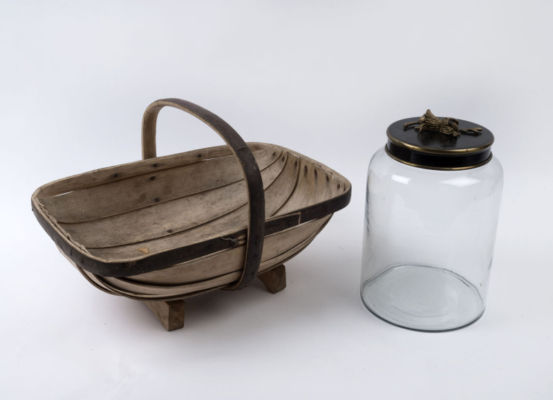 Hand blown large glass jar with metal lid, together with a Sussex birch wood trug, 20th century, the jar 34cm high, 21cm wide