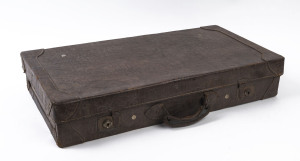 A crocodile skin slimline suitcase, circa 1900, ​45cm high, 73cm wide, 14cm deep