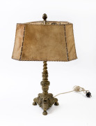 An Italian brass base table lamp with parchment shade, early 20th century, ​70cm high