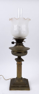 An antique oil lamp (converted to electric), brass Corinthian column base with single black button burner, late 19th century, ​72cm high