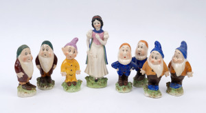 SNOW WHITE AND SEVEN DWARFS: incomplete set of hollow ceramic figurines, some duplicated, comprising Snow White, Bashful (2), Sleepy (2), Grumpy (2) & Dopey; made in Japan; c.1940s-50s, tallest (Snow White) 21cm, dwarfs 14-15cm. (8)