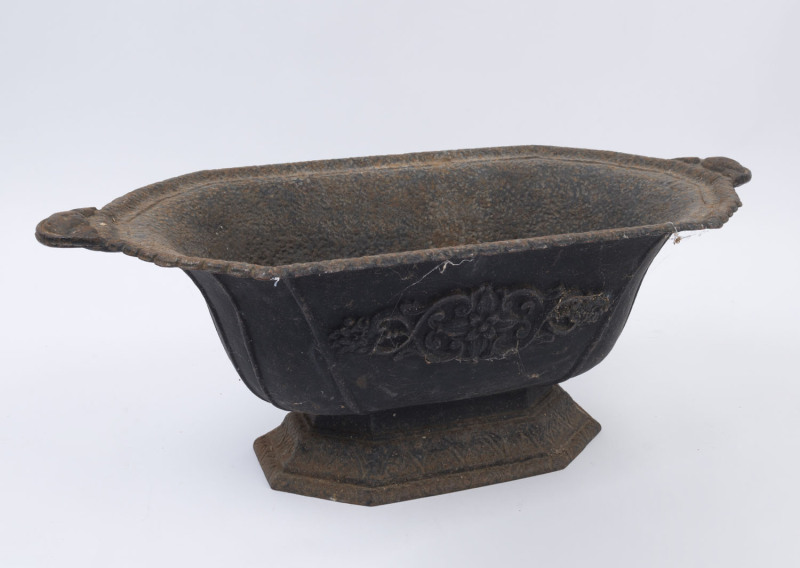 A painted cast iron planter pot, 19th/20th century, ​23cm high, 61cm wide, 32cm deep