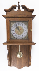 A reproduction wall clock in timber case with quartz movement, mid to late 20th century, 85cm high