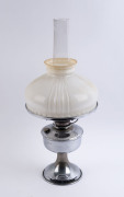 An Aladdin oil lamp, nickel plate with original glass shade and chimney, early 20th century, 60cm high