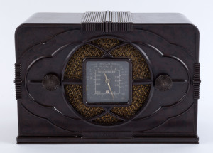 ASTOR "Mickey Mouse" brown bakelite mantel radio, circa 1937, ​15.5cm high, 23cm wide, 13cm deep