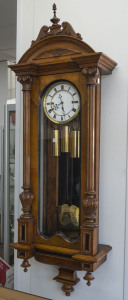 A Vienna regulator, triple weight quarter striking, grand sonnerie wall clock, eight day movement striking on double gongs for the hour and quarters, circa 1890, 132cm high