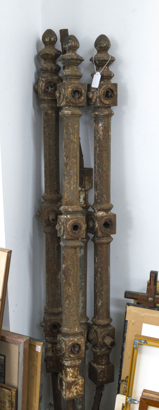 A set of four cast iron hitching posts, 19th century, 152cm high