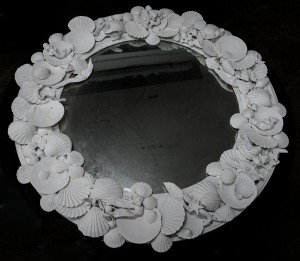 A round shell framed mirror with white painted finish, late 20th century, ​84cm diameter