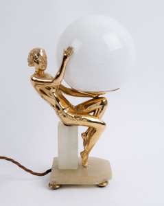 An Art Deco lamp with gilded bronze female figure on an onyx base, circa 1930, ​33cm high