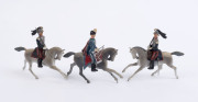 BRITAINS: - 54mm Hollow Cast Lead - Assorted Military Figures Mounted on Horseback: including Australian Army Officers (3), Canadian Mounties (3), Danish Cavalryman & French Cuirassiers (9); most with the weapon-carrying arm articulated. (19 items) - 3