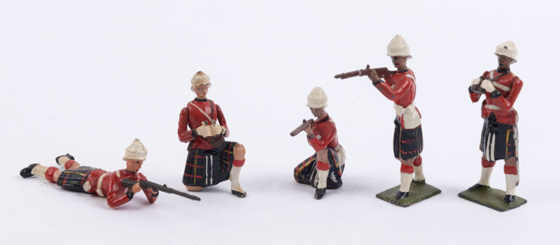 BRITAINS: - 54mm Hollow Cast Lead - Gordon Highlanders: Eighteen figures in Colonial (Boer War) uniform comprising Standing Riflemen (4), Kneeling Riflemen (5), Prone Riflemen (7), plus single figures Standing with Binoculars or Kneeling with Binoculars.