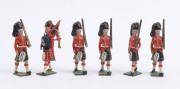 BRITAINS: - 54mm Hollow Cast Lead - Highlanders: group of figures including Mounted Officer & Bagpipers (2); most of the figures with an articulated rifle carrying arm. (21) - 2