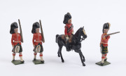 BRITAINS: - 54mm Hollow Cast Lead - Highlanders: group of figures including Mounted Officer & Bagpipers (2); most of the figures with an articulated rifle carrying arm. (21) - 5