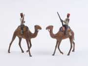 BRITAINS: - 54mm Hollow Cast Lead - Kings African Rifles soldiers (18, all with articulated left arm holding rifle), plus four Egyptian Camel Corps figures with Camels. (22 items) - 5