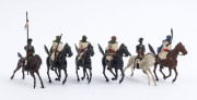 BRITAINS: - 54mm Hollow Cast Lead - Bedouin/Arabic Figures: with Mounted on Horseback Charging Figures (16), armed with rifles, lances or swords, one with bugle; Unmounted Figures (17), five charging with fixed bayonets, three charging with lances, seven - 7