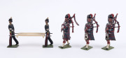 BRITAINS: - 54mm Hollow Cast Lead - Finely Painted Group of British Military Figures: including Royal Regiment of Scotland figures wearings trews (8), Scottish Bagpipe Players (3), Stretcher Bearers (2) with stretcher, Coldstream Guards with Bearskin Hats - 3