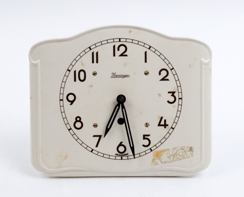 A vintage German wall clock, mid 20th century, ​21cm high, 24cm wide
