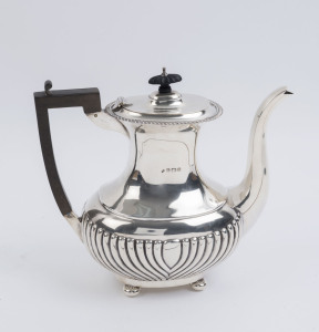 An English sterling silver teapot made in Birmingham, circa 1911, 24cm high, 830 grams total