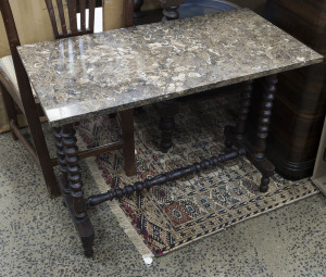 A bobbin reel cottage table with fossilized shell stone slab top, 19th century, ​68cm high, 92cm wide, 46cm deep