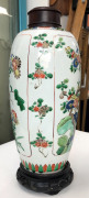 A fine Chinese famille verte porcelain vase of slender ovoid form painted with panels of prunus, peonies and chrysanthemum among rockwork, Kang-Xi period, circa 1700, 25cm high. PROVENANCE: The John Kenny Collection - 4