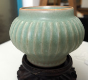 A Chinese Longquan green celadon ribbed vase, Southern Song Dynasty, circa 1300, with later carved wooden stand, the vase 10.5cm high, 13.5cm diameter - 4