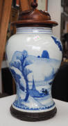 A fine Chinese baluster shaped vase with underglaze blue decoration of fishing figures in landscape, Kangxi Period, circa 1700, with carved hardwood lid and timber stand, 26cm high - 5