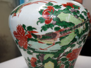 A Chinese Wucai transitional vase decorated with peonies and exotic birds, circa 1600, with a fine carved timber stand, 36cm high - 4