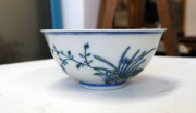 A Chinese porcelain bowl with floral enamel decoration, 18th/19th century, ​5.5cm high, 12cm diameter - 2
