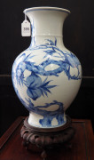 A Chinese baluster shaped blue and white porcelain vase with wooden stand, Republic period, ​34cm high - 3
