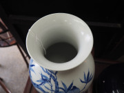 A Chinese baluster shaped blue and white porcelain vase with wooden stand, Republic period, ​34cm high - 10