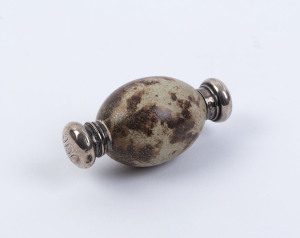 An unusual egg shaped double ended scent bottle with silver caps, 19th century, 7.5cm long