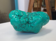 A Mongolian natural turquoise mineral specimen on timber stand, ​the specimen 22cm high, 16cm wide, 10cm deep - 10