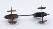 DUELLING KNIGHTS: rare wind-up lithographed tinplate toy mounted on wheels, toy moves in a to-and-fro motion when mechanism is activated; made in Germany c.1920s, length 22cm, height 13cm. - 4