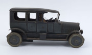 LARGE WIND-UP LIMOUSINE: lithographed tinplate car by Distler (Germany), with green body, black roof, intact running boards, and uniformed driver, two opening doors; c.1920s, length 30cm, height 15cm. - 2